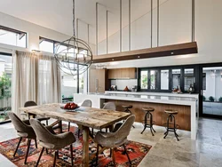 Living room with access to the kitchen in a modern style photo