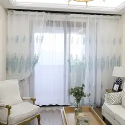 Tulle in the living room with a balcony photo