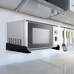 Microwave on brackets in the kitchen photo
