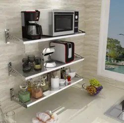 Microwave on brackets in the kitchen photo