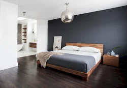 Gray bedroom with wood in the interior