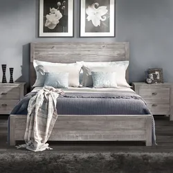 Gray bedroom with wood in the interior