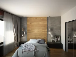 Gray bedroom with wood in the interior