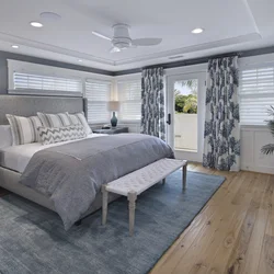 Gray bedroom with wood in the interior
