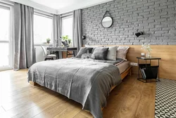 Gray bedroom with wood in the interior