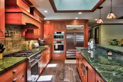 Green countertop in the kitchen interior