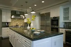 Green countertop in the kitchen interior