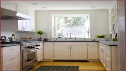 Kitchen With A Large Window In The Middle Design