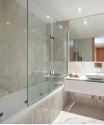 Glass partitions for bathtubs in the interior