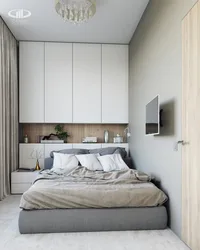 Interior design of a small bedroom with a bed