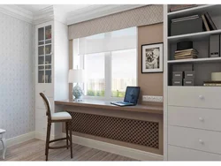 Bedroom interior with work area by the window