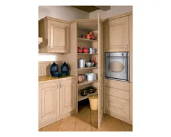 Corner cabinet in the kitchen interior photo