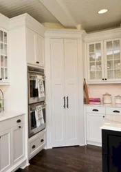 Corner cabinet in the kitchen interior photo