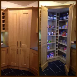 Corner cabinet in the kitchen interior photo