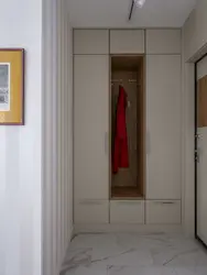 Built-in wardrobe in a niche in the hallway photo