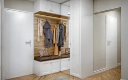 Built-in wardrobe in a niche in the hallway photo