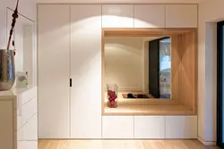 Built-in wardrobe in a niche in the hallway photo