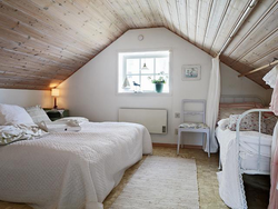 Bedroom design in light colors attic