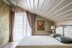 Bedroom design of a wooden house photo attic