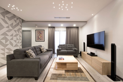 Beautiful interior of a living room in an apartment in a modern style