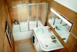 Photo of a bathroom with a bathtub in the middle