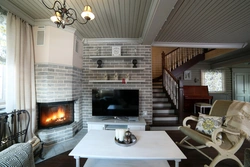 Interiors With A Fireplace In A Country House Living Room