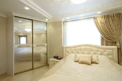 Built-in wardrobe in the bedroom interior photo