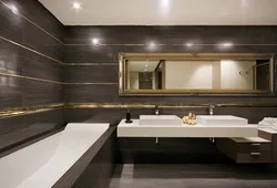 Porcelain tiles for floors and walls in the bathroom photo