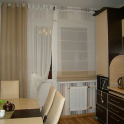 Window in the kitchen design of curtains and tulle