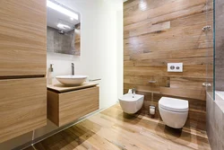 Bathroom tiles and wood photo