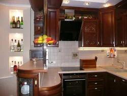 Kitchen design in a panel house with a ventilation duct
