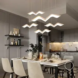 Modern ceiling lamps in the kitchen interior