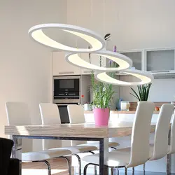 Modern ceiling lamps in the kitchen interior