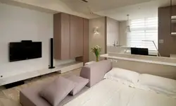 Дизайн интерьера гостиной с кроватью фото
