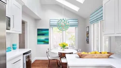 In the kitchen there are 2 windows on different walls photo