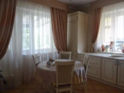 In The Kitchen There Are 2 Windows On Different Walls Photo