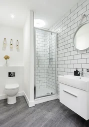 Small bathroom design with white tiles