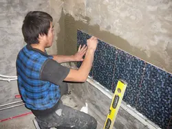 Photo of how to lay tiles in the bathroom