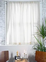 Tulle Up To The Window Sill In A Modern Bedroom Photo