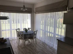 Kitchen living room with access to the terrace design photo