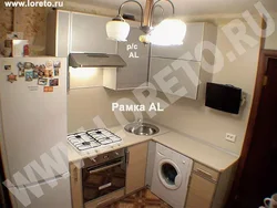 Kitchen 8 sq m design with refrigerator and washing machine