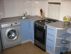 Kitchen 8 sq m design with refrigerator and washing machine