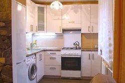 Kitchen 8 sq m design with refrigerator and washing machine