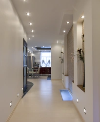 Lighting in the hallway in the apartment suspended ceiling with photo