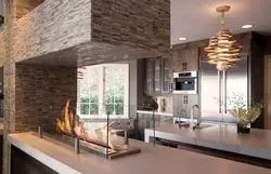 Kitchen interior with fireplace in apartment