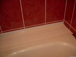 How to seal a bathtub from a crack in the wall photo