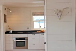 Paneled kitchen photo