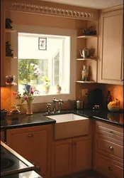 Design of a small corner kitchen with a window