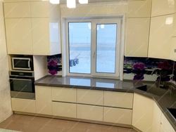Design of a small corner kitchen with a window