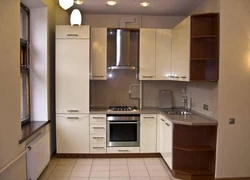 Corner kitchens with pencil case and refrigerator photo